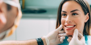 Woman smiling in dentist’s chair