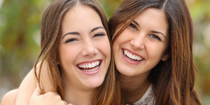 two women with white teeth